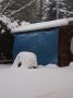 Januar 2010... es schneit ... das Holz ist hinter der Plane gut geschützt